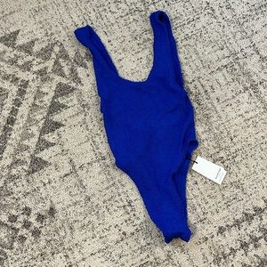 Bond-eye bound Linda one piece in lapis shimmer